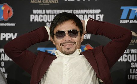 Manny Pacquiao smiles during a news conference where he announce his upcoming world welterweight championship bout against Timothy Bradley at the Beverly Hills Hotel January 19, 2016 in Beverly Hills, California.