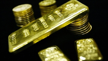 Photo: Gold gains on softer dollar, widening Russia-Ukraine tensions